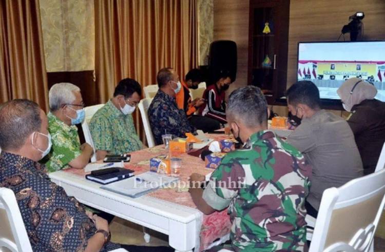 Bupati Inhil Ikuti Rakoor Bersama Gubernur Riau Terkait Peningkatan Pasien Covid-19 di Provinsi Riau
